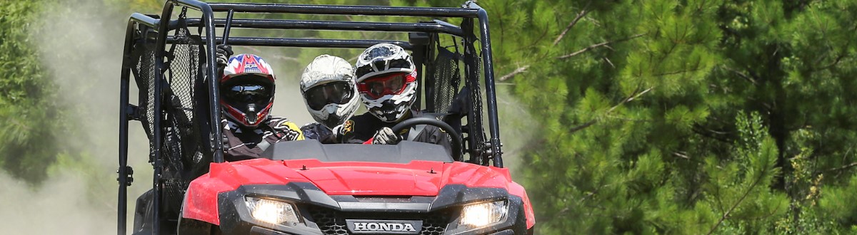 Honda ATV. Friends having fun racing across the mountains. Of Classic Powersports of Rockwall at 1030 E Interstate 30.
